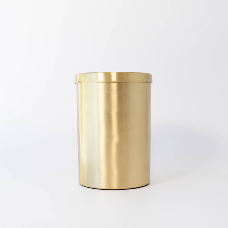 Buddy pet urn. Image of brass cylinder urn in brass.