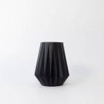 Buddy pet urn. Image of folded origami urn in black.