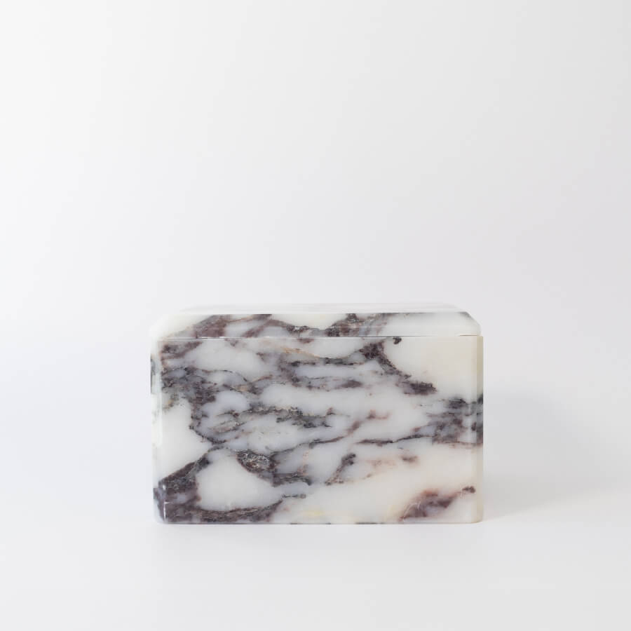 Buddy pet urn. Image of marble chest urn in viola calacatta.